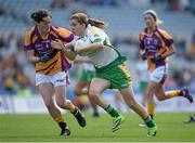 29 September 2013; Mairéad Daly, Offaly, in action against Clara Donnelly, Wexford. TG4 All-Ireland Ladies Football Junior Championship Final, Offaly v Wexford, Croke Park, Dublin. Picture credit: Brendan Moran / SPORTSFILE