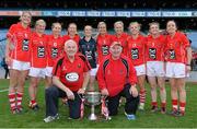 29 September 2013; Cork players who have won 8 All-Ireland Championships, from left, Juliet Murphy, Deirdre O'Reilly, Nollaig Cleary, Rena Buckley, Elanie Harte, Bríd Stack, Angela Walsh, Valerie Mulcahy, Briege Corkery and Geraldine O'Flynn, celebrate with manager Eamonn Ryan, selector Frankie Honohan and the Brendan Martin cup after the game. TG4 All-Ireland Ladies Football Senior Championship Final, Cork v Monaghan, Croke Park, Dublin. Picture credit: Brendan Moran / SPORTSFILE