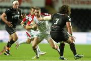 4 October 2013; Darren Cave, Ulster, is tackled by Adam Jones, Ospreys. Celtic League 2013/14, Round 5, Ospreys v Ulster, Liberty Stadium, Swansea, Wales. Picture credit: Steve Pope / SPORTSFILE