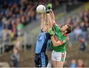 6 October 2013; Cathal Cregg, Western Gaels, in action against Darragh Donnelly, St Brigid's. Roscommon County Senior Club Football Championship Final, St Brigid's v Western Gaels, Dr. Hyde Park, Roscommon. Picture credit: Pat Murphy / SPORTSFILE