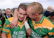 6 October 2013; Dan Currams, Kilcormac/Killoughey, left, is congratulated by team-mate Peter Healion following their side's victory. Offaly County Senior Club Hurling Championship Final, Kilcormac/Killoughey v Birr, O'Connor Park, Tullamore, Co. Offaly. Picture credit: Stephen McCarthy / SPORTSFILE