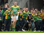 6 October 2013; Dan Currams, Kilcormac/Killoughey, is congratulated by young supporters following his side's victory. Offaly County Senior Club Hurling Championship Final, Kilcormac/Killoughey v Birr, O'Connor Park, Tullamore, Co. Offaly. Picture credit: Stephen McCarthy / SPORTSFILE