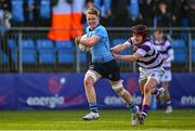 10 March 2025; Oliver Maybury of St Michael's College is tackled by Shaun Priede of Clongowes Wood College during the Bank of Ireland Leinster Rugby Boys Schools Junior Cup semi-final match between St Michael's College and Clongowes Wood College at Energia Park in Dublin. Photo by Shauna Clinton/Sportsfile