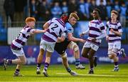 10 March 2025; Oliver Maybury of St Michael's College is tackled by Shaun Priede of Clongowes Wood College during the Bank of Ireland Leinster Rugby Boys Schools Junior Cup semi-final match between St Michael's College and Clongowes Wood College at Energia Park in Dublin. Photo by Shauna Clinton/Sportsfile