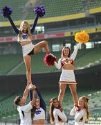10 March 2025; Kansas State University cheerleader Katelyn Egan, is held aloft by Aron Castillo and Maddie Rose, alongside Iowa State University Cheerleader Natalie Maxwell, is held aloft by Grace Krouse and Bailey Houston, at the Aviva Stadium Dublin as tickets for the 2025 Aer Lingus College Football Classic between Kansas State University and Iowa State University are on sale now at www.ticketmaster.ie/collegefootball. The fixture will take place at the Aviva Stadium, Dublin, on Saturday, 23rd August 2025 and limited tickets are available. Photo by Ramsey Cardy/Sportsfile
