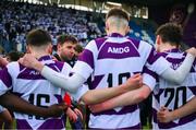 10 March 2025; Clongowes Wood College players huddle after their side's defeat in the Bank of Ireland Leinster Rugby Boys Schools Junior Cup semi-final match between St Michael's College and Clongowes Wood College at Energia Park in Dublin. Photo by Shauna Clinton/Sportsfile