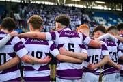 10 March 2025; Clongowes Wood College players huddle after their side's defeat in the Bank of Ireland Leinster Rugby Boys Schools Junior Cup semi-final match between St Michael's College and Clongowes Wood College at Energia Park in Dublin. Photo by Shauna Clinton/Sportsfile