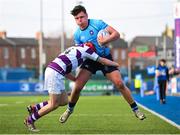 10 March 2025; Toby O'Leary of St Michael's College is tackled by Ryan Mahon of Clongowes Wood College during the Bank of Ireland Leinster Rugby Boys Schools Junior Cup semi-final match between St Michael's College and Clongowes Wood College at Energia Park in Dublin. Photo by Shauna Clinton/Sportsfile