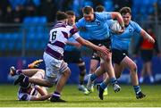 10 March 2025; Sam Kennedy of St Michael's College in action against Philip Kenny of Clongowes Wood College during the Bank of Ireland Leinster Rugby Boys Schools Junior Cup semi-final match between St Michael's College and Clongowes Wood College at Energia Park in Dublin. Photo by Shauna Clinton/Sportsfile