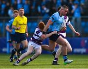 10 March 2025; Herbie Boyle of St Michael's College is tackled by Robert Wyse of Clongowes Wood College during the Bank of Ireland Leinster Rugby Boys Schools Junior Cup semi-final match between St Michael's College and Clongowes Wood College at Energia Park in Dublin. Photo by Shauna Clinton/Sportsfile