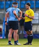 10 March 2025; Referee Sam Holt speaks to Conall Farrell of St Michael's College during the Bank of Ireland Leinster Rugby Boys Schools Junior Cup semi-final match between St Michael's College and Clongowes Wood College at Energia Park in Dublin. Photo by Shauna Clinton/Sportsfile
