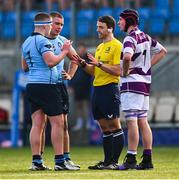 10 March 2025; Referee Sam Holt speaks to St Michael's College players Conall Farrell, left, and Herbie Boyle, and Senan Walsh of Clongowes Wood College during the Bank of Ireland Leinster Rugby Boys Schools Junior Cup semi-final match between St Michael's College and Clongowes Wood College at Energia Park in Dublin. Photo by Shauna Clinton/Sportsfile