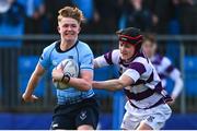 10 March 2025; Oliver Maybury of St Michael's College is tackled by Shaun Priede of Clongowes Wood College during the Bank of Ireland Leinster Rugby Boys Schools Junior Cup semi-final match between St Michael's College and Clongowes Wood College at Energia Park in Dublin. Photo by Shauna Clinton/Sportsfile