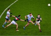 25 January 2025; Ciarán Kilkenny of Dublin in action against Enda Hession, left, and Conor Reid of Mayo during the Allianz Football League Division 1 match between Dublin and Mayo at Croke Park. Photo by Stephen McCarthy/Sportsfile