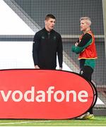 11 March 2025; Interim head coach Simon Easterby, right, in conversation with Sam Prendergast during an Ireland Rugby squad training session at IRFU High Performance Centre in Dublin. Photo by Ramsey Cardy/Sportsfile