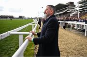 11 March 2025: Trainer Gavin Cromwell watch the final lengths of the The My Pension Expert Arkle Novices’ Chase on day one of the Cheltenham Racing Festival at Prestbury Park in Cheltenham, England. Photo by David Fitzgerald/Sportsfile