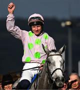 11 March 2025: Jockey Paul Townend, aboard Lossiemouth, celebrates winning the Close Brothers Mares’ Hurdle Race on day one of the Cheltenham Racing Festival at Prestbury Park in Cheltenham, England. Photo by David Fitzgerald/Sportsfile