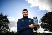 12 March 2025; Aidan Keena of St Patrick's Athletic with his SSE Airtricity / SWI Player of the Month Award for February 2025 at the Sport Ireland Campus in Dublin. Photo by Ramsey Cardy/Sportsfile