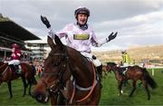 11 March 2025: Lorcan Williams, aboard Golden Ace, celebrates after winning the Unibet Champion Hurdle on day one of the Cheltenham Racing Festival at Prestbury Park in Cheltenham, England. Photo by Harry Murphy/Sportsfile