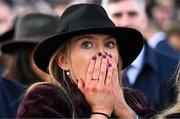 11 March 2025: Racegoer Jodie O'Leary reacts after watching Constitution Hill fall during the Unibet Champion Hurdle on day one of the Cheltenham Racing Festival at Prestbury Park in Cheltenham, England. Photo by David Fitzgerald/Sportsfile