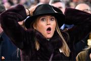 11 March 2025: Racegoer Jodie O'Leary reacts after watching Constitution Hill fall during the Unibet Champion Hurdle on day one of the Cheltenham Racing Festival at Prestbury Park in Cheltenham, England. Photo by David Fitzgerald/Sportsfile