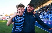 11 March 2025; Killian McGivern of St Vincent's Castleknock College celebrates with assistant coach James Henry after their side's victory in the Bank of Ireland Leinster Rugby Boys Schools Junior Cup semi-final match between Blackrock College and St Vincent's Castleknock College at Energia Park in Dublin. Photo by Shauna Clinton/Sportsfile
