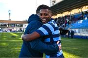 11 March 2025; Ebe Flynn of St Vincent's Castleknock College celebrates with head coach Sam Boriss after their side's victory in the Bank of Ireland Leinster Rugby Boys Schools Junior Cup semi-final match between Blackrock College and St Vincent's Castleknock College at Energia Park in Dublin. Photo by Shauna Clinton/Sportsfile