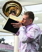 11 March 2025: Winning jockey Lorcan Williams celebrates after winning the Unibet Champion Hurdle with Golden Ace on day one of the Cheltenham Racing Festival at Prestbury Park in Cheltenham, England. Photo by David Fitzgerald/Sportsfile