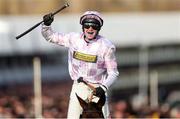 11 March 2025: Jockey Lorcan Williams, aboard Golden Ace, celebrates winning the Unibet Champion Hurdle on day one of the Cheltenham Racing Festival at Prestbury Park in Cheltenham, England. Photo by Harry Murphy/Sportsfile