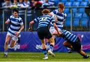 11 March 2025; Paul Harnett of Blackrock College is tackled by Johnny O'Donnell of St Vincent's Castleknock College during the Bank of Ireland Leinster Rugby Boys Schools Junior Cup semi-final match between Blackrock College and St Vincent's Castleknock College at Energia Park in Dublin. Photo by Shauna Clinton/Sportsfile