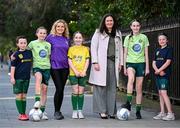 11 March 2025; FAI's head of women and girls football Hannah Dingley with Railway Union Football Club's, from left, Molly Byrne, Jessie Keating, coach Lisa Lyons, Mai Coonan, Grace Cahill and Jessica Lyons at St Stephen's Green in Dublin, ahead of the launch of FAI's Women & Girls' Football Action Plan held at the Mansion House in Dublin. Photo by Stephen McCarthy/Sportsfile