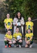 11 March 2025; FAI's head of women and girls football Hannah Dingley with Railway Union Football Club players, Grace Cahill, back left, and Jessie Keating, back right, with, from left, Molly Byrne, Mai Coonan and Jessica Lyons at St Stephen's Green in Dublin, ahead of the launch of FAI's Women & Girls' Football Action Plan held at the Mansion House in Dublin. Photo by Stephen McCarthy/Sportsfile