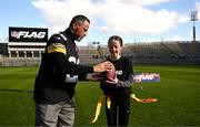 12 March 2025; More than 50 young players from Greenlanes National School and Scoil an tSeachtar Laoch (both from Dublin aged between 10 and 12 years old) took to the pitch in Croke Park today to showcase their NFL Flag Football skills. Fast paced and accessible for all, flag football is the non-contact format of American football and one of the fastest growing sports globally. Played by 20 million people in 100 countries - women and girls leading some of the largest growth - flag football will be included on the LA 2028 Olympic Games program, led by efforts of the International Federation of American Football (IFAF) and supported by the NFL. Greenlanes NS won the inaugural NFL Flag National Championship in December 2024 and represented Ireland at the NFL International Championships at the NFL Pro Bowl Games in Orlando, Florida, U.S., earlier this year. NFL Flag is the official flag football program of the NFL. The NFL will expand its NFL Flag program in Ireland, in a three-year plan to engage over 50,000 young people, as part of an NFL 2025 Dublin Game legacy commitment to growing the game in partnership with Sport Ireland and American Football Ireland. Pictured in Croke Park enjoying the action is former Steelers player Rod Woodson with Bella Hackett. For more information and to get involved with NFL Flag visit https://www.nfl.com/news/get-involved-with-nfl-flag-uk-and-ireland. Photo by Brendan Moran/Sportsfile