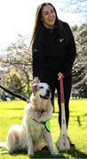 12 March 2025; Cork camogie player Amy O'Connor and ambassador guide dog Belle during the launch of the GPA and Irish Guide Dogs for the Blind official charity partnership between the two organisations for 2025, at the National Botanic Gardens of Ireland in Glasnevin, Dublin. Photo by Seb Daly/Sportsfile