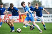 12 March 2025; Rian Durkan of Rice College in action against Daniel Noonan of Blackrock College during the FAI Schools Dr Tony O'Neill Senior National Cup final match between Blackrock College and Rice College at Athlone Town Stadium in Athlone, Westmeath. Photo by Matt Browne/Sportsfile
