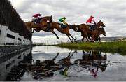 12 March 2025; Runners and riders jump the water during The Brown Advisory Novices’ Steeple Chase on day two of the Cheltenham Racing Festival at Prestbury Park in Cheltenham, England. Photo by David Fitzgerald/Sportsfile