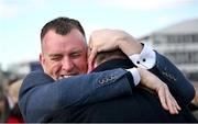 12 March 2025; Winning owners Colin Teahon, left, and Ger Teahon celebrate after winning The Glenfarclas Cross Country Steeple Chase with Stumptown on day two of the Cheltenham Racing Festival at Prestbury Park in Cheltenham, England. Photo by David Fitzgerald/Sportsfile