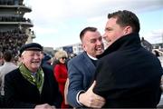 12 March 2025; Winning owners Colin Teahon, left, and Ger Teahon, right, celebrate after winning The Glenfarclas Cross Country Steeple Chase with Stumptown on day two of the Cheltenham Racing Festival at Prestbury Park in Cheltenham, England. Photo by David Fitzgerald/Sportsfile