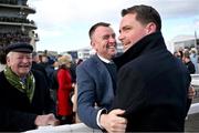 12 March 2025; Winning owners Colin Teahon, left, and Ger Teahon, right, celebrate after winning The Glenfarclas Cross Country Steeple Chase with Stumptown on day two of the Cheltenham Racing Festival at Prestbury Park in Cheltenham, England. Photo by David Fitzgerald/Sportsfile