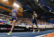 9 March 2025; Andrew Coscoran of Ireland, right, crosses the line to finish sixth in the men's 3000m during day four of the European Athletics Indoor Championships 2025 at the Omnisport Apeldoorn in Apeldoorn, Netherlands. Photo by Sam Barnes/Sportsfile
