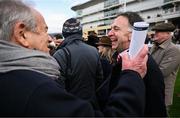 13 March 2025; Trainer Henry de Bromhead, right, with Michael Buckley, owner of Constitution Hill, after he sent out Air Of Entitlement to win the Ryanair Mares Novices Hurdle on day three of the Cheltenham Racing Festival at Prestbury Park in Cheltenham, England. Photo by David Fitzgerald/Sportsfile