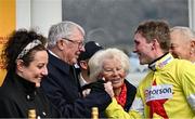 13 March 2025; Former Manchester United manager, and part owner of Caldwell Potter, Sir Alex Ferguson with jockey Harry Cobden after winning the Jack Richards Novices Limited Handicap Chase on day three of the Cheltenham Racing Festival at Prestbury Park in Cheltenham, England. Photo by David Fitzgerald/Sportsfile