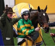 13 March 2025; Winning jockey Mark Walsh and trainer Willie Mullins after Fact To File won the Ryanair Chase on day three of the Cheltenham Racing Festival at Prestbury Park in Cheltenham, England. Photo by Harry Murphy/Sportsfile