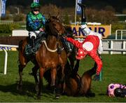 13 March 2025; Jockey JJ Slevin, right, falls from Home By The Lee as Ga Law, with Gavin Sheehan up, narrowly avoids colliding during the Paddy Power Stayers' Hurdle on day three of the Cheltenham Racing Festival at Prestbury Park in Cheltenham, England. Photo by David Fitzgerald/Sportsfile