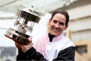 13 March 2025; Jockey Rachael Blackmore celebrates with the cup after winning the Paddy Power Stayers' Hurdle on Bob Olinger during day three of the Cheltenham Racing Festival at Prestbury Park in Cheltenham, England. Photo by Harry Murphy/Sportsfile