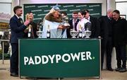 13 March 2025; TV Personality Gemma Collins presents the cup to winning jockey Rachael Blackmore after winning the Paddy Power Stayers' Hurdle on Bob Olinger during day three of the Cheltenham Racing Festival at Prestbury Park in Cheltenham, England. Photo by David Fitzgerald/Sportsfile