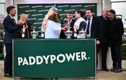 13 March 2025; TV Personality Gemma Collins presents the cup to winning jockey Rachael Blackmore after winning the Paddy Power Stayers' Hurdle on Bob Olinger during day three of the Cheltenham Racing Festival at Prestbury Park in Cheltenham, England. Photo by David Fitzgerald/Sportsfile