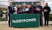 13 March 2025; Jockey Rachael Blackmore with the cup, winning connections and TV Personality Gemma Collins after victory in the Paddy Power Stayers' Hurdle on Bob Olinger during day three of the Cheltenham Racing Festival at Prestbury Park in Cheltenham, England. Photo by David Fitzgerald/Sportsfile