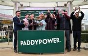 13 March 2025; Jockey Rachael Blackmore with the cup, winning connections and TV Personality Gemma Collins after victory in the Paddy Power Stayers' Hurdle on Bob Olinger during day three of the Cheltenham Racing Festival at Prestbury Park in Cheltenham, England. Photo by David Fitzgerald/Sportsfile