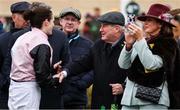 13 March 2025; Jockey Rachael Blackmore is congratulated by JP Mcmanus after winning the Paddy Power Stayers' Hurdle on Bob Olinger during day three of the Cheltenham Racing Festival at Prestbury Park in Cheltenham, England. Photo by Harry Murphy/Sportsfile